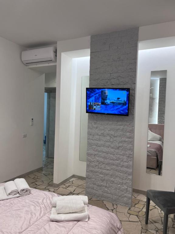 A bed or beds in a room at Residenza N&D Luxury