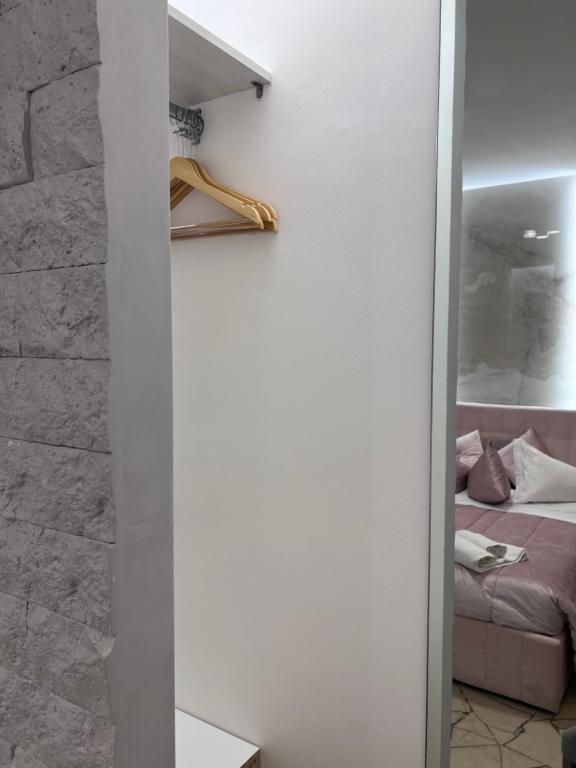 A bed or beds in a room at Residenza N&D Luxury