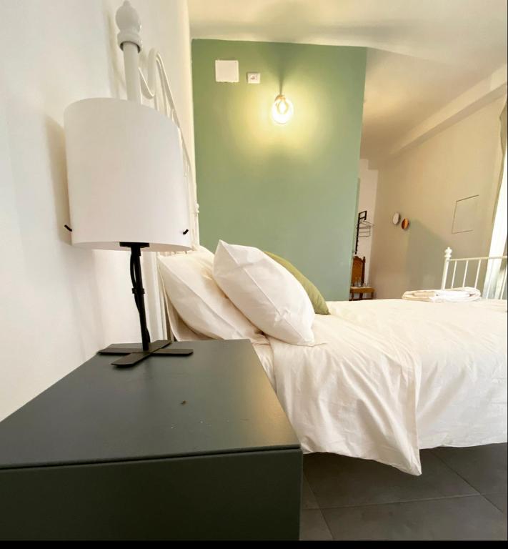 Postel nebo postele na pokoji v ubytování Il B&B dei viaggiatori