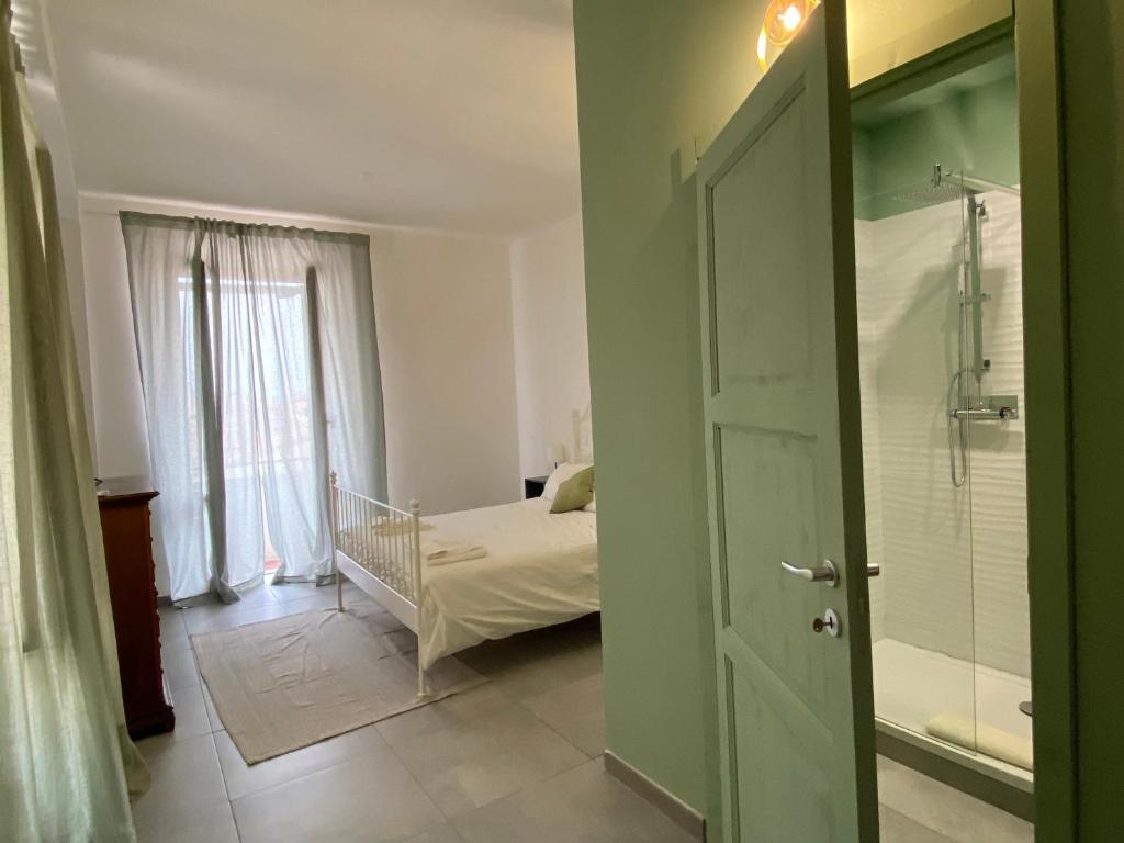 Postel nebo postele na pokoji v ubytování Il B&B dei viaggiatori