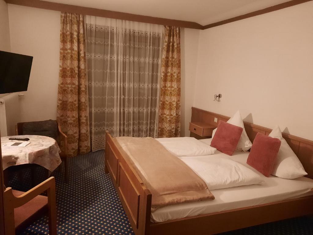 Łóżko lub łóżka w pokoju w obiekcie Apartments Edenhof