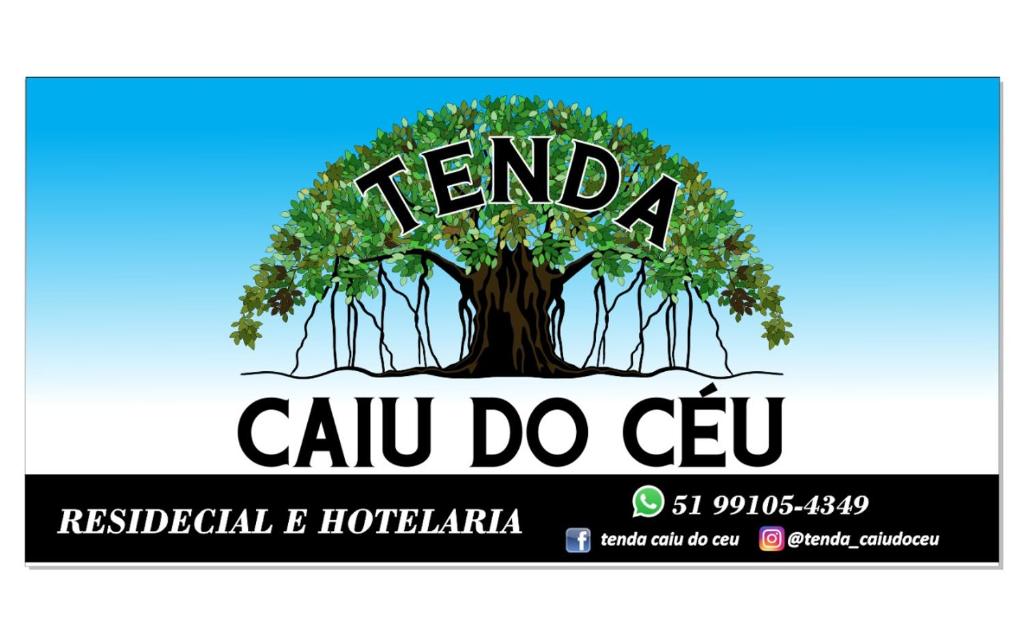 un árbol con las palabras tenda calu do ccu en Tenda Caiu do Céu, en Osório