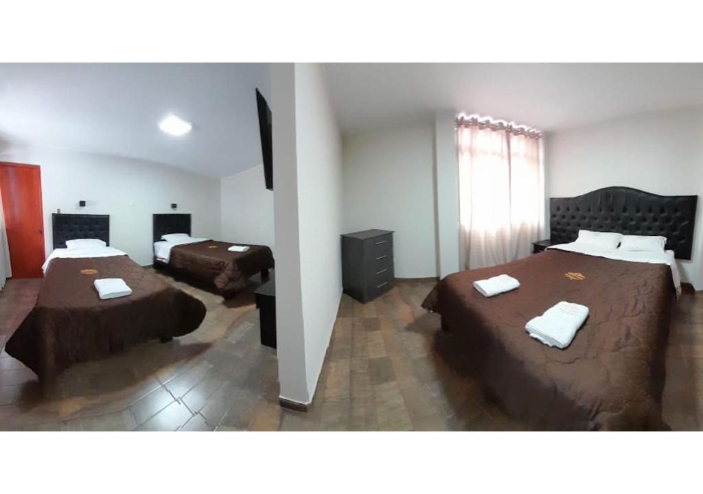 Postel nebo postele na pokoji v ubytování RONALD HOTEL