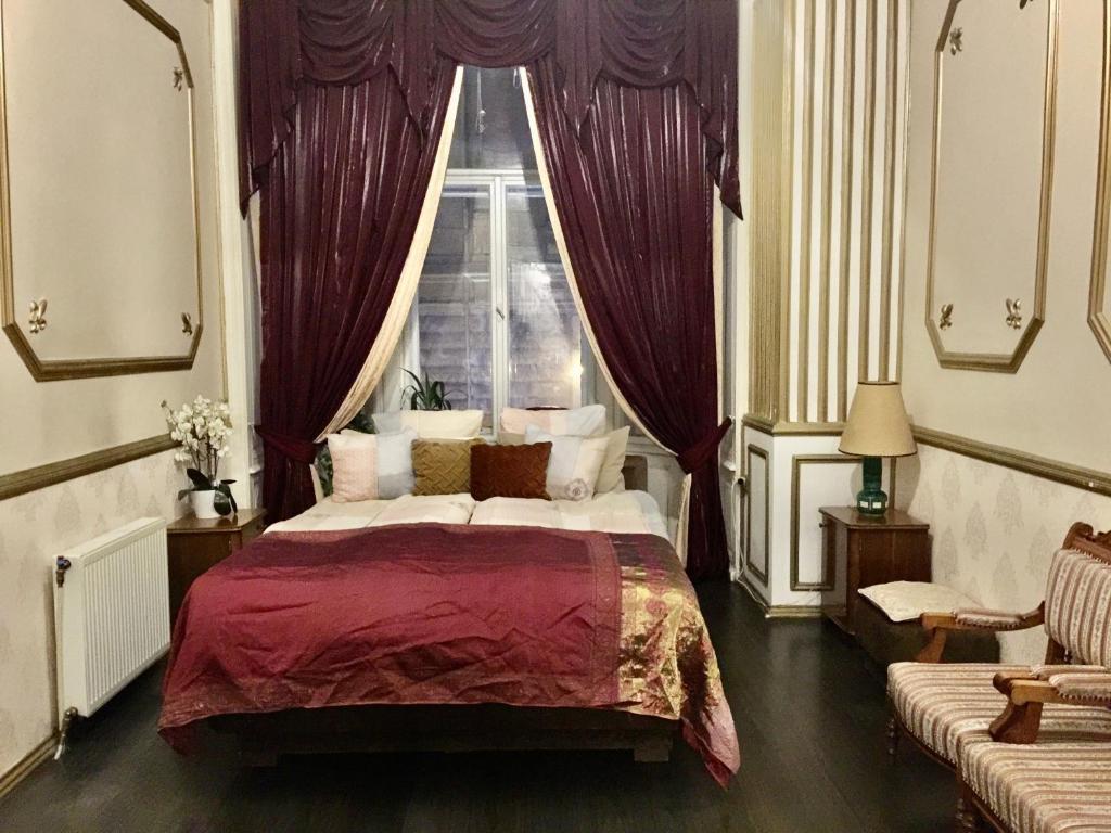 Кровать или кровати в номере Secession Luxury Apartment