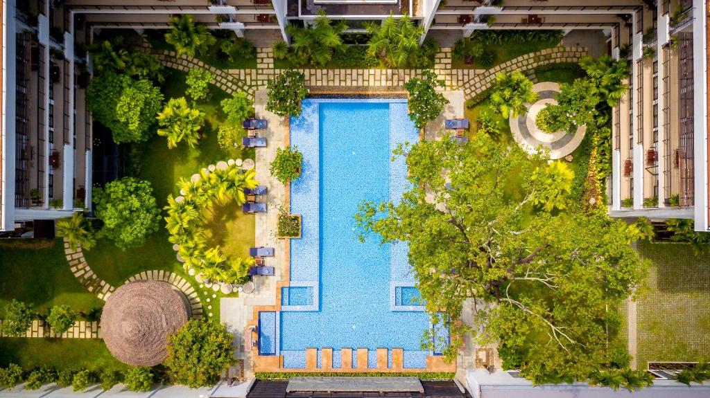 an overhead view of a swimming pool in a building at Koulen Hotel in Siem Reap