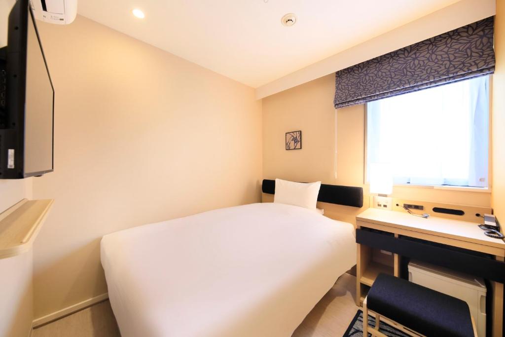 TV a/nebo společenská místnost v ubytování Hotel Nihonbashi Saibo