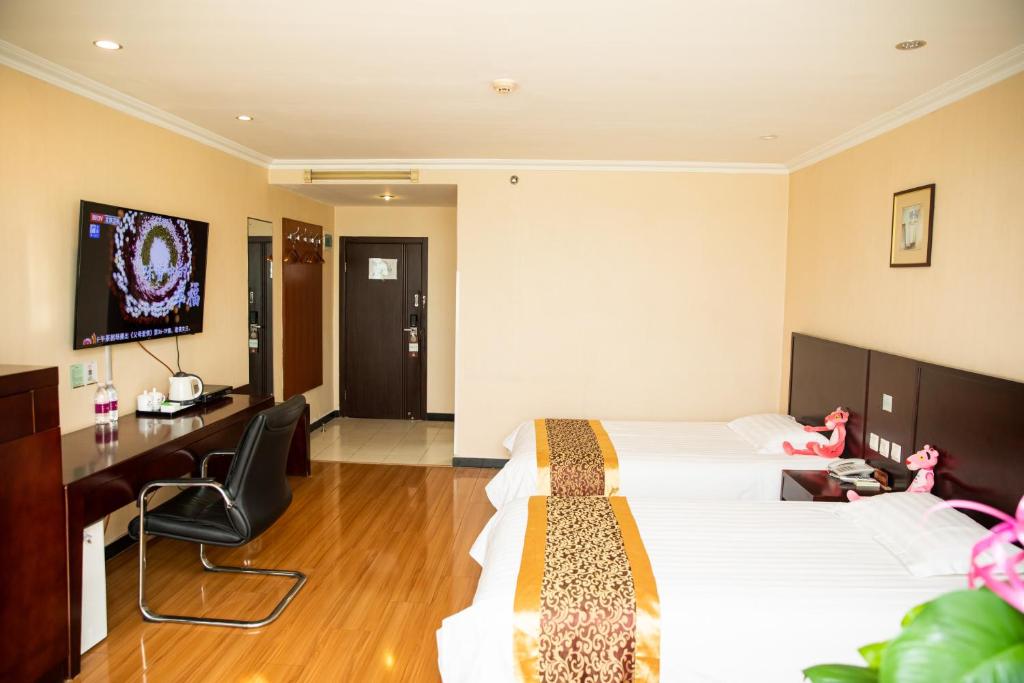 TV a/nebo společenská místnost v ubytování Meiyuan Hotel