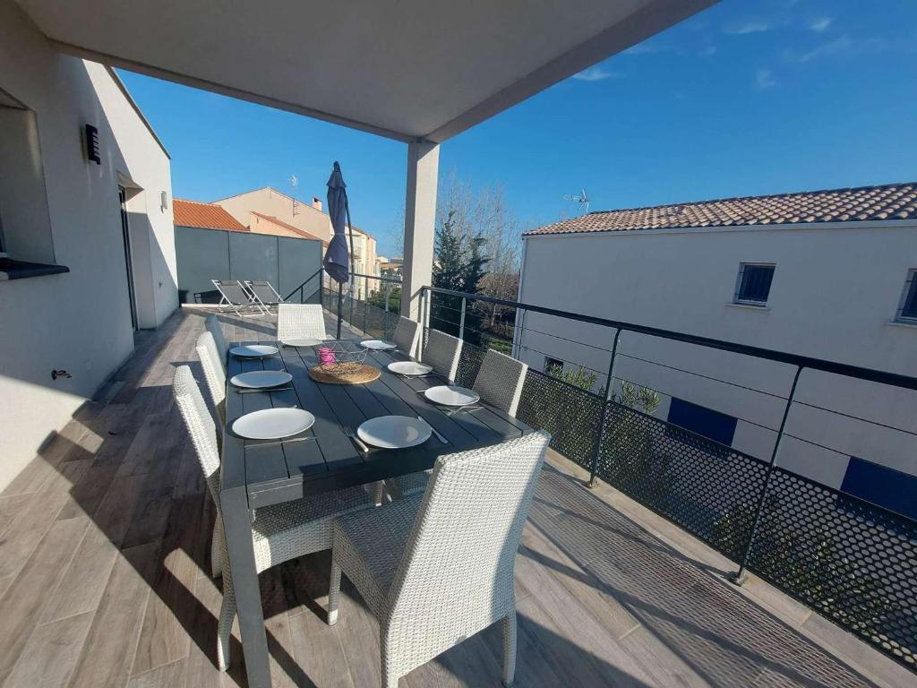 Balkón alebo terasa v ubytovaní Appartement Marseillan-Plage, 4 pièces, 9 personnes - FR-1-326-780