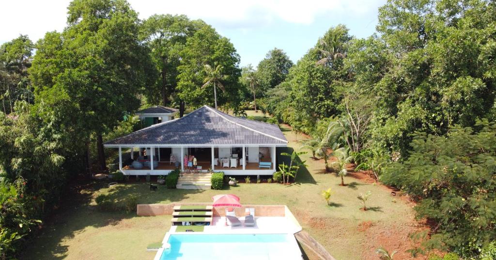 an aerial view of a house with a pool at Baan Zourite seaview villa in Ko Mak