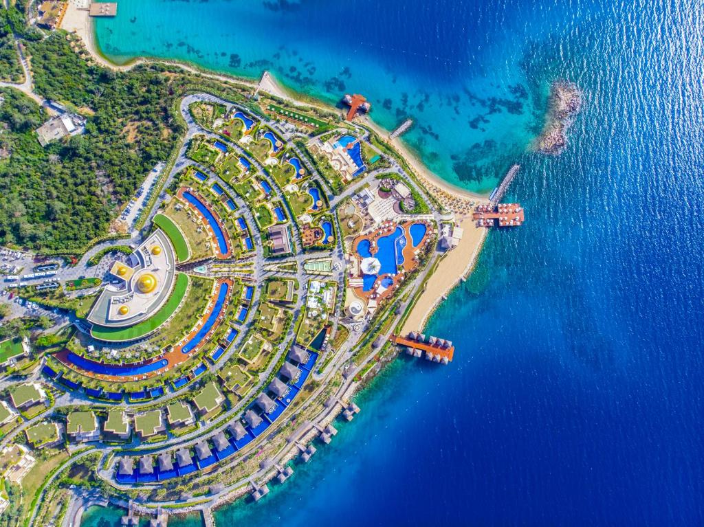 an aerial view of a resort near the water at Be Premium Bodrum in Torba