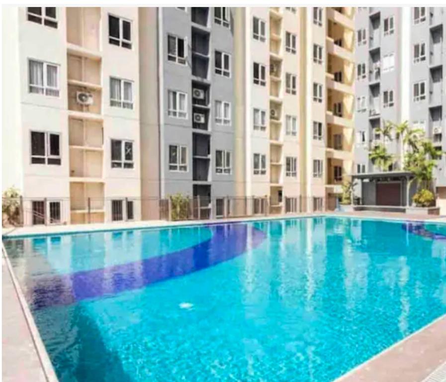 The swimming pool at or close to Victoria Sports Tower - Cozy Ambiance Condo Unit