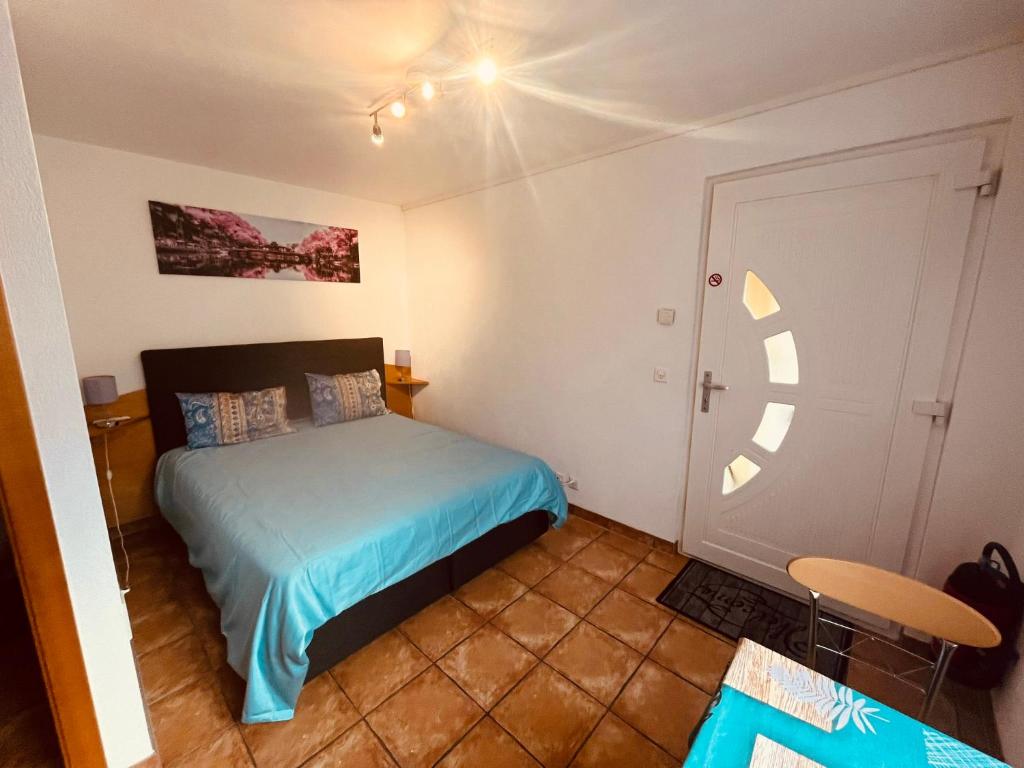 Postel nebo postele na pokoji v ubytování Gîte la Cigale