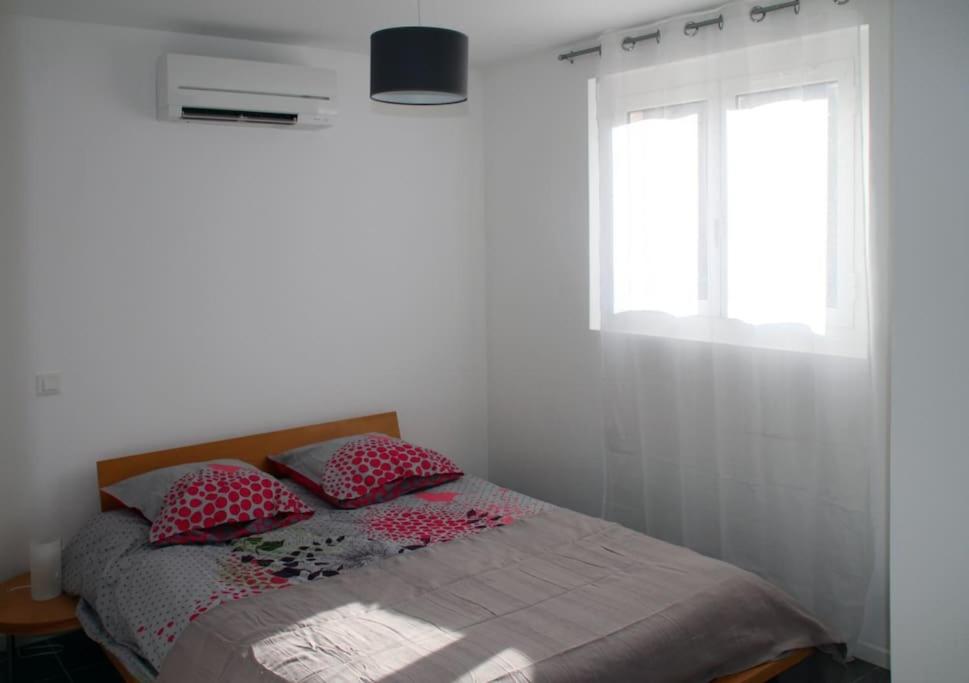Posteľ alebo postele v izbe v ubytovaní Appart dans maison 2 km de la plage