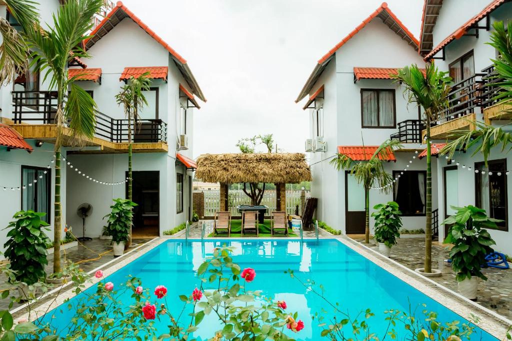 a view of the courtyard of a house with a swimming pool at Tam Coc Mandala Villa & Homestay in Ninh Binh
