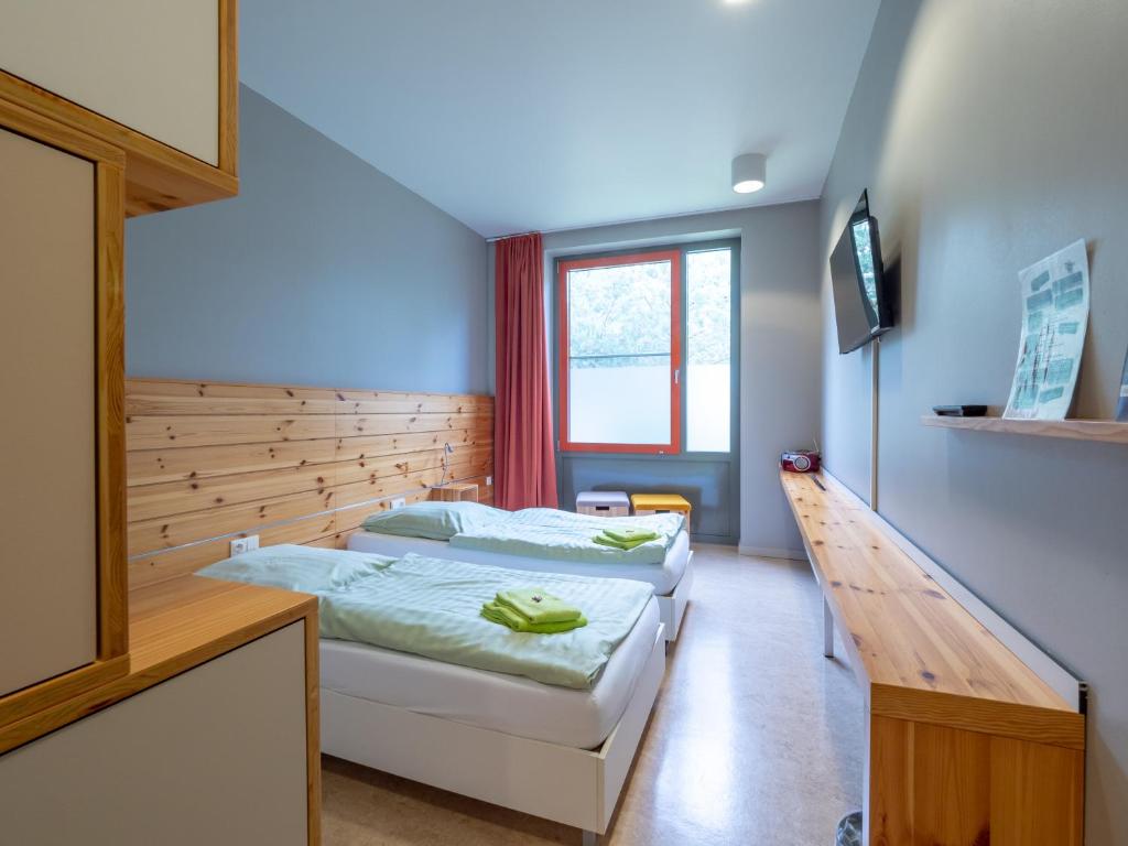 Postel nebo postele na pokoji v ubytování Haus 54