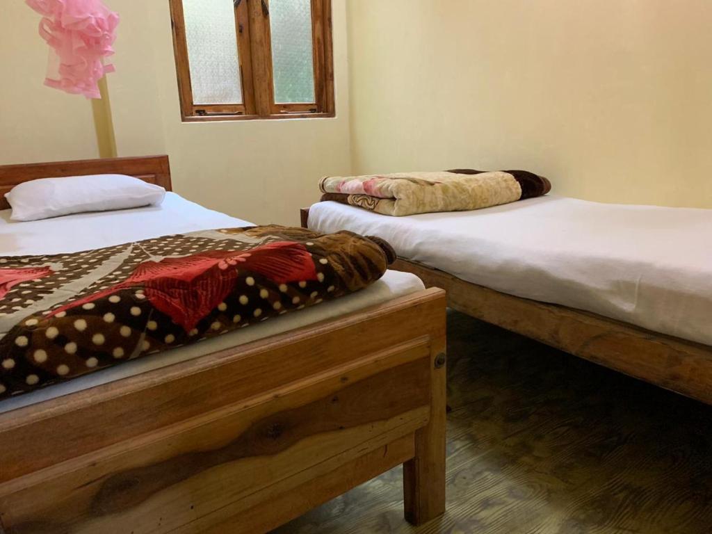 Postel nebo postele na pokoji v ubytování Hello Super Hostel