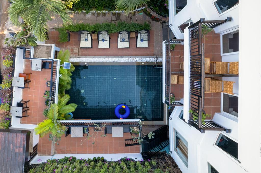 an aerial view of a building with a swimming pool at The Five Senses Boutique Hotel in Siem Reap