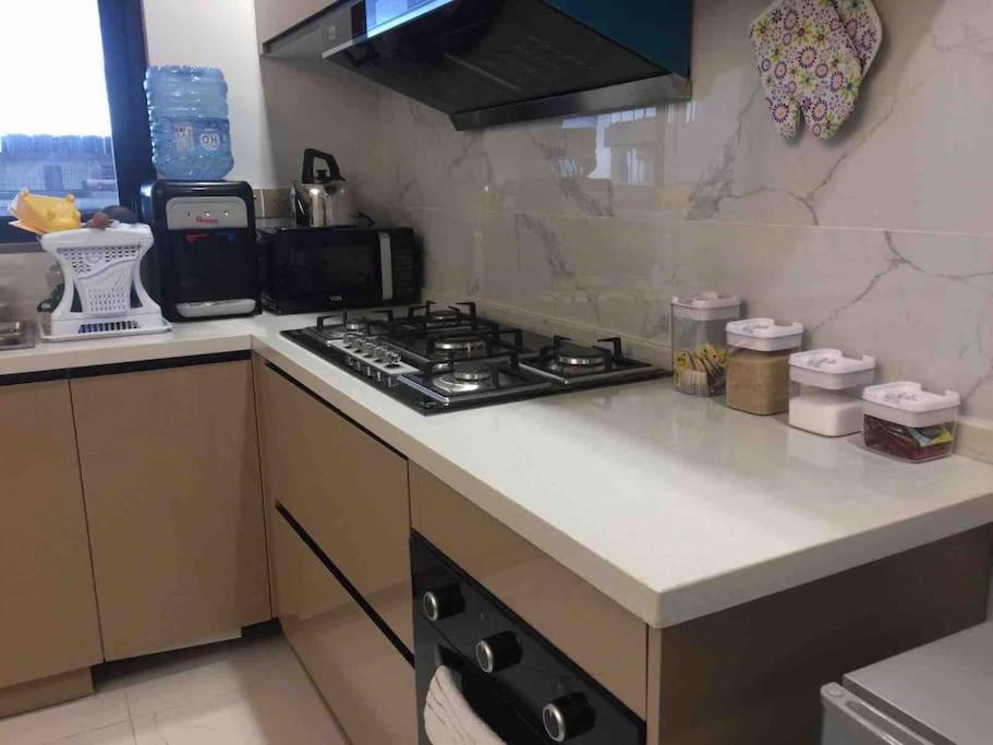 Kuchyň nebo kuchyňský kout v ubytování Joe Apartments