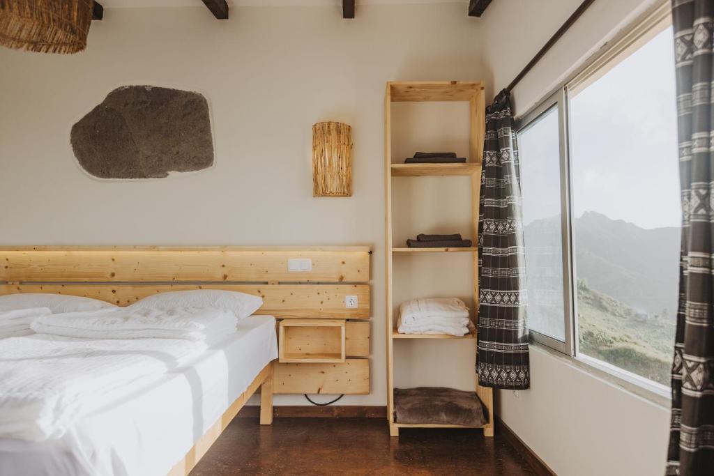 Postel nebo postele na pokoji v ubytování Strela Mountain Lodge