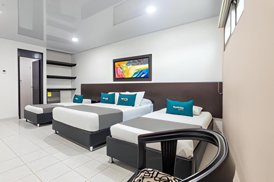 Postel nebo postele na pokoji v ubytování Hotel Ancor