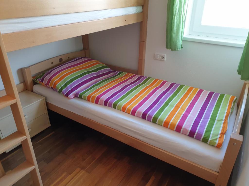 Postel nebo postele na pokoji v ubytování Ferienwohnung Bergsteiger