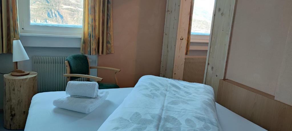 Postel nebo postele na pokoji v ubytování Pension Fellis