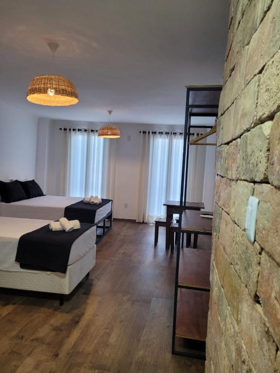 Postel nebo postele na pokoji v ubytování Pelourinho Boutique Hotel - OH HOTÉIS