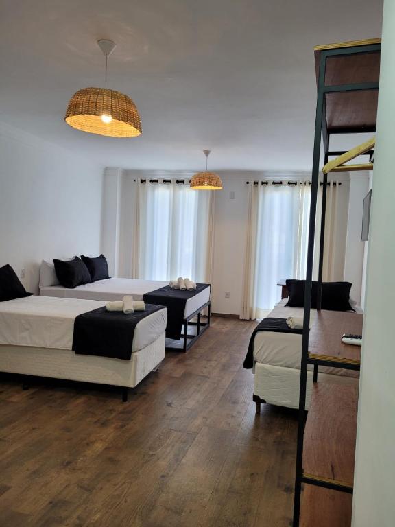 Postel nebo postele na pokoji v ubytování Pelourinho Boutique Hotel - OH HOTÉIS
