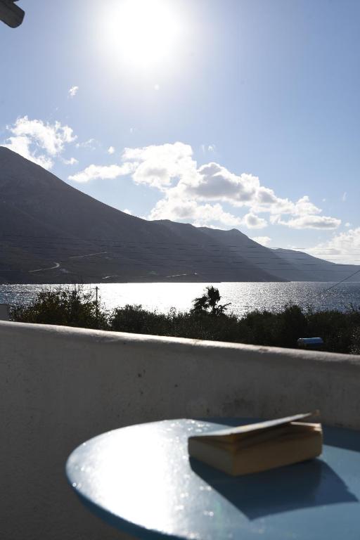 a bath tub with a view of a body of water at Elia Studios Amorgos near the sea in Aegiali