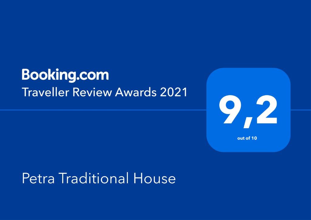 a blue box with the text traveler review awards at Petra Traditional House in Episkopión