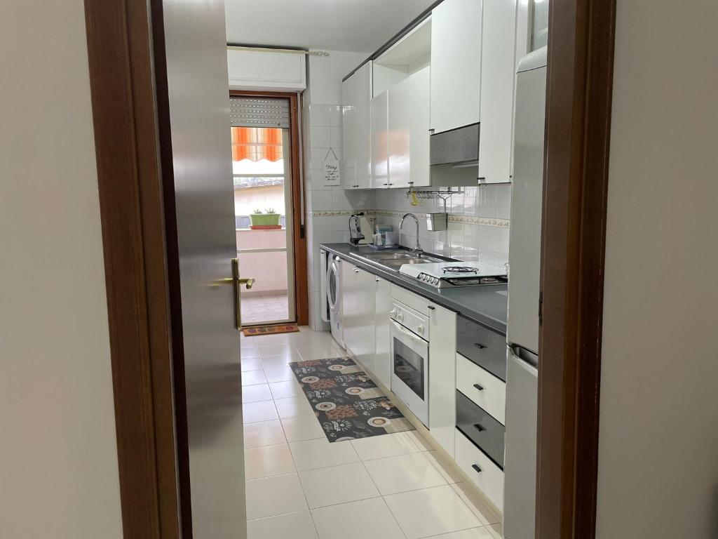 Kuchyň nebo kuchyňský kout v ubytování B&b Binario38