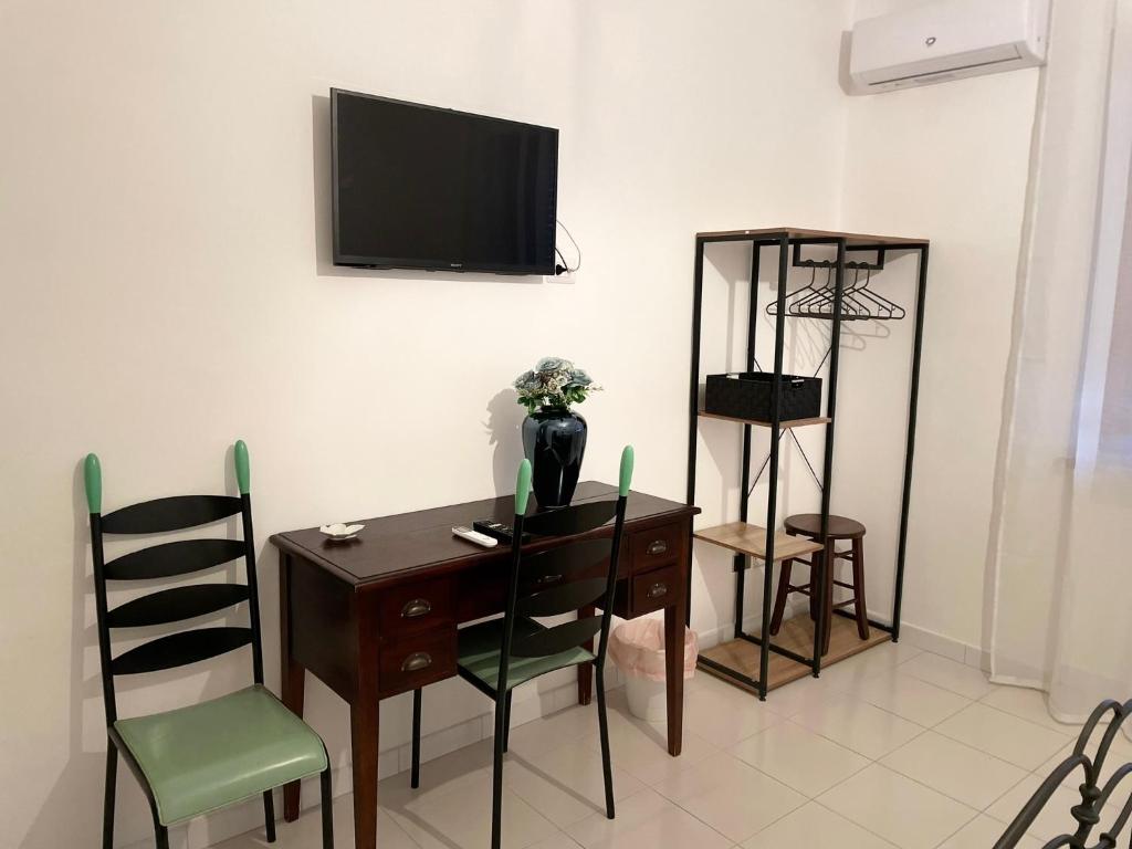 TV a/nebo společenská místnost v ubytování B&b Binario38