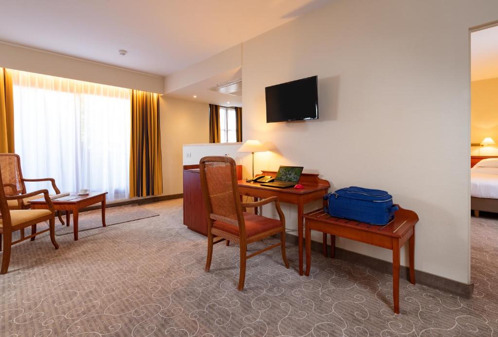 TV a/nebo společenská místnost v ubytování Rosenburg Hotel Brugge