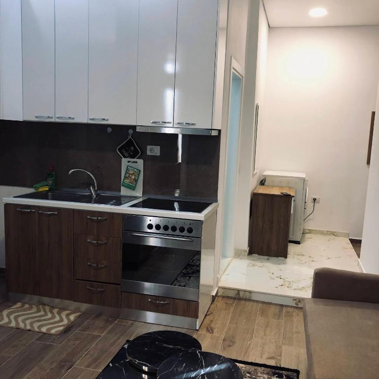 Kuchyň nebo kuchyňský kout v ubytování Rezidenca SHOPI Apartments