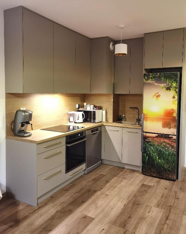 Kuchyňa alebo kuchynka v ubytovaní Apartament Olecko Centrum