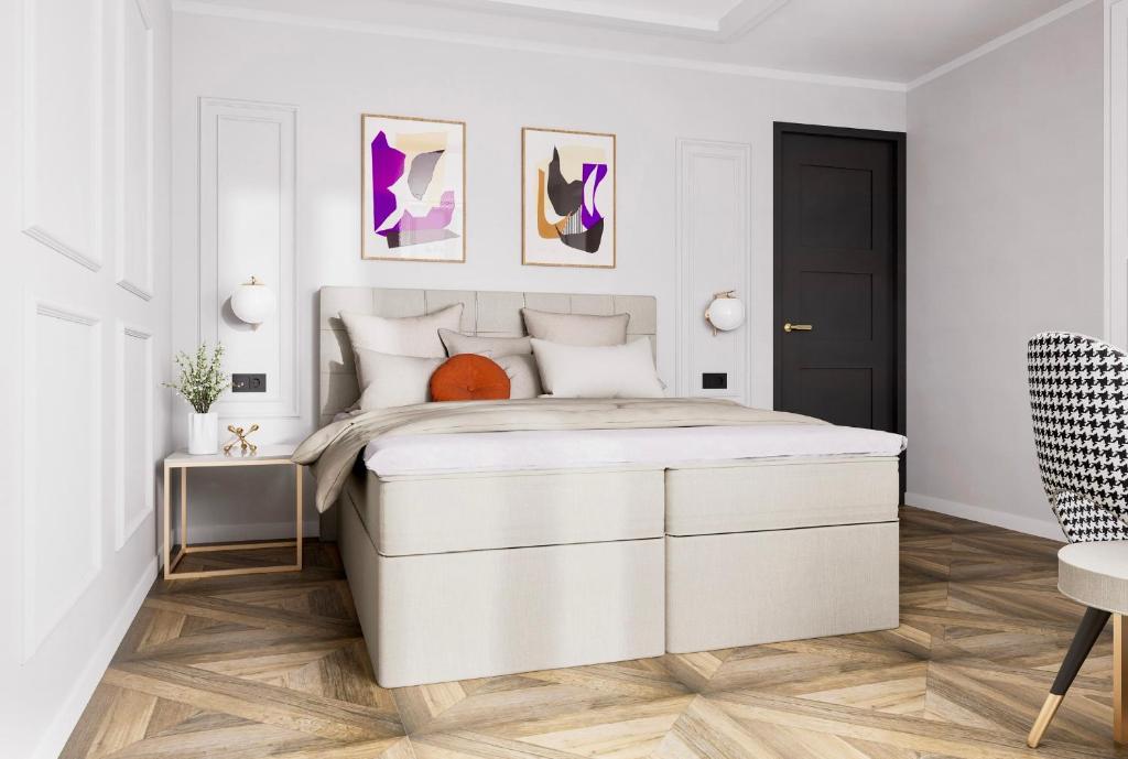 Ένα ή περισσότερα κρεβάτια σε δωμάτιο στο boutique Villa Dorma
