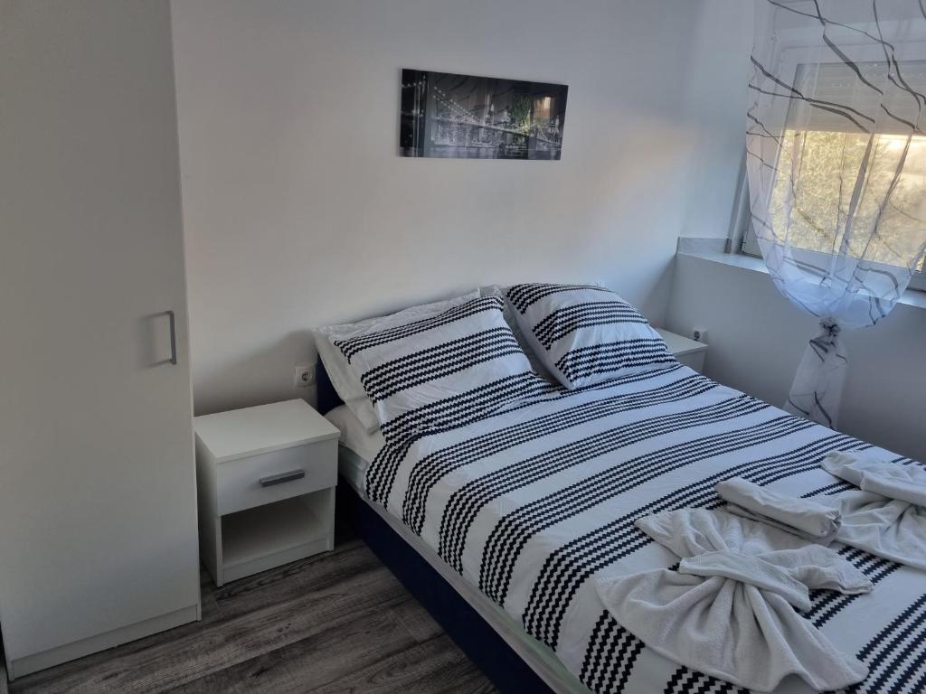 Кровать или кровати в номере Guest House Roki & Diva