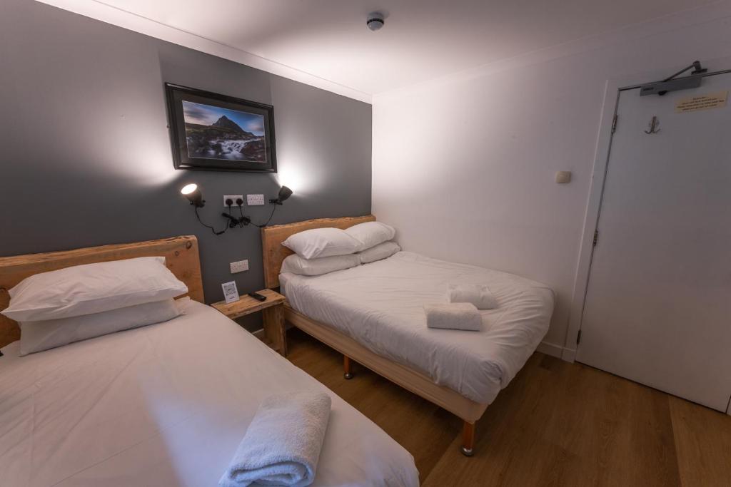 Postel nebo postele na pokoji v ubytování Roam West