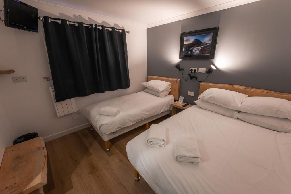 Postel nebo postele na pokoji v ubytování Roam West