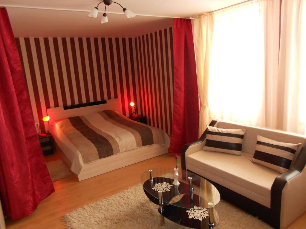 Postel nebo postele na pokoji v ubytování Guest House Tsenovi