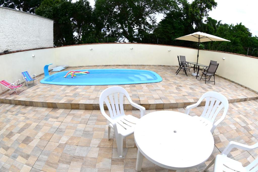 A piscina em ou perto de Beto Carreiro - Praia - Relaxar à beira da piscina ou prepara algo na churrasqueira - Aproveite o seu tempo livre com a família e amigos em nosso espaço
