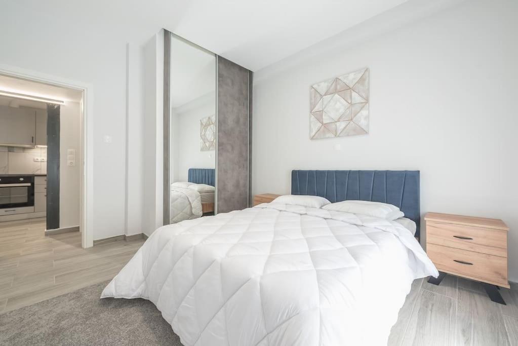Postel nebo postele na pokoji v ubytování Athens Luxurious Apartment