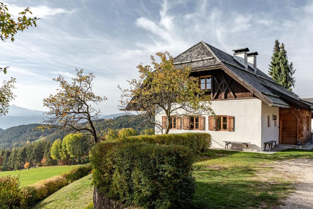 a house with a view of the mountains at Haus Sophie in Longostagno