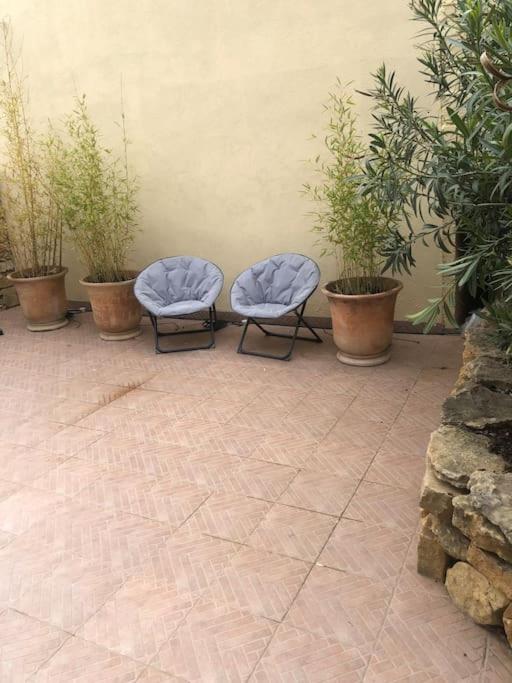 Patio alebo iná vonkajšia časť ubytovania CHARMANT STUDIO DANS MAS