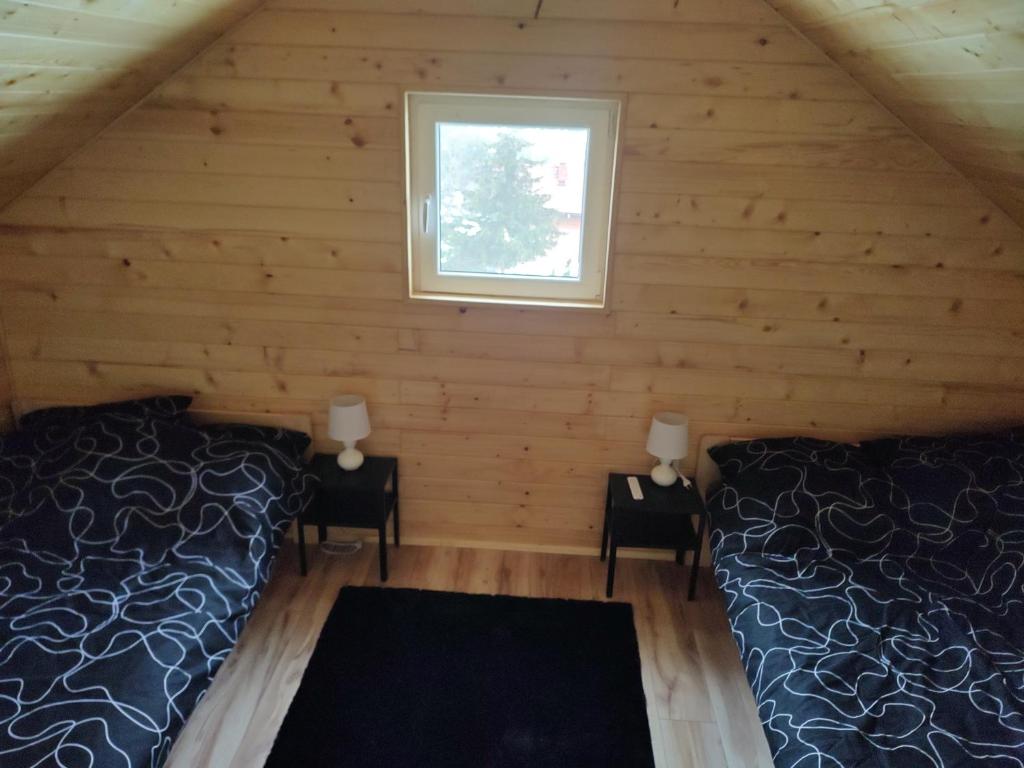 Fotografia z galérie ubytovania Domek całoroczny pod sosenką v destinácii Łapanów