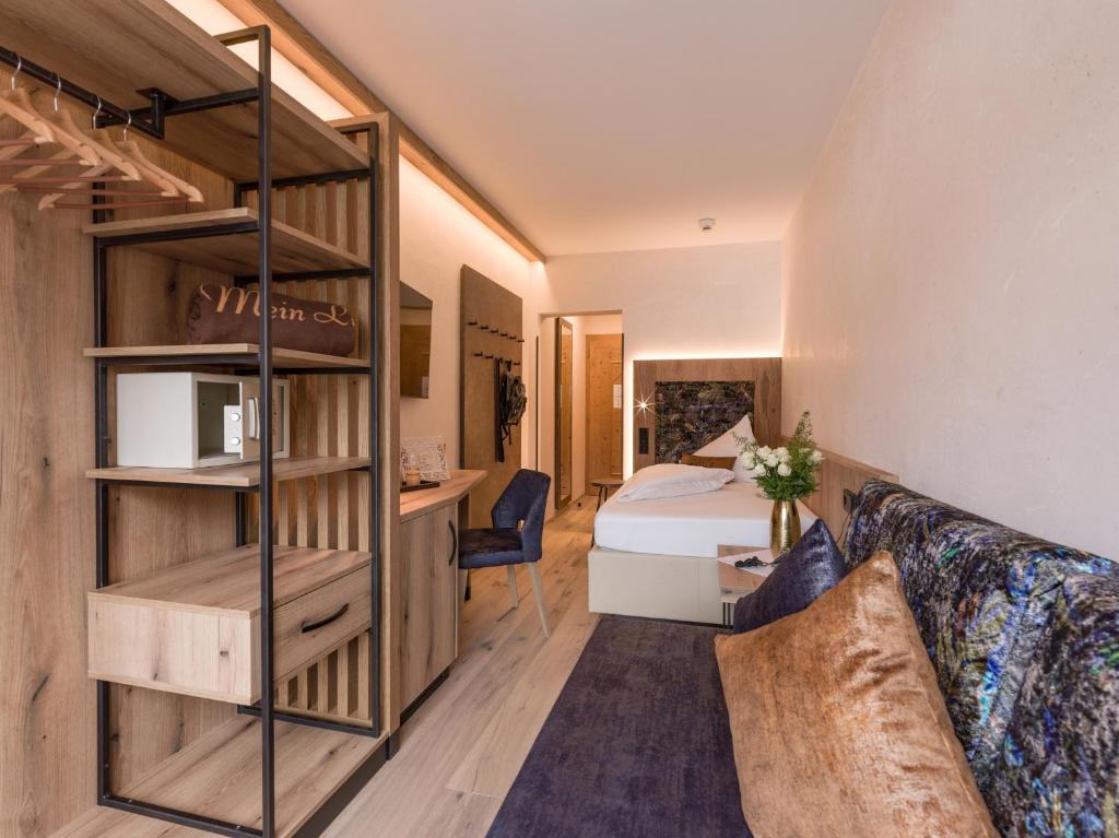 Posteľ alebo postele v izbe v ubytovaní Liebes Caroline 4-Sterne-Hotel