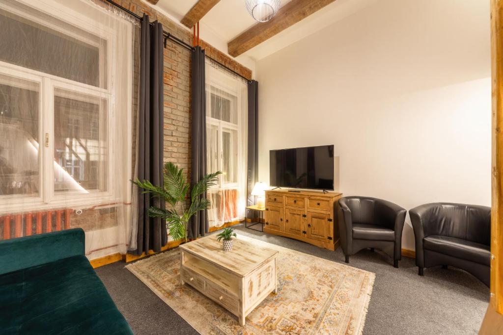 Televízia a/alebo spoločenská miestnosť v ubytovaní S42 Hotel Prague