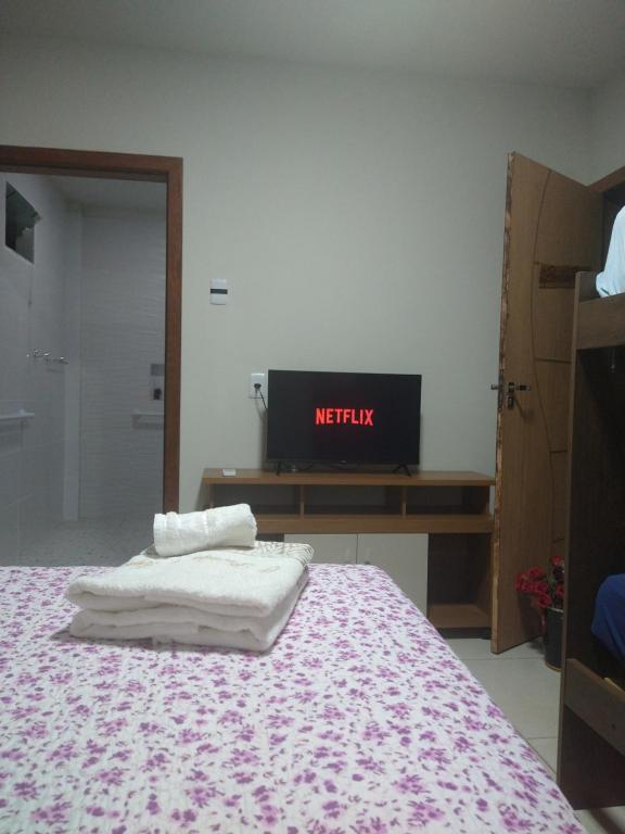 Postel nebo postele na pokoji v ubytování Pousada OPA - O Paraíso é Aqui Abrolhos