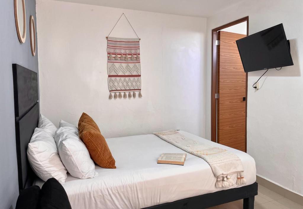 Postel nebo postele na pokoji v ubytování Aldeazul by Andiani Travel