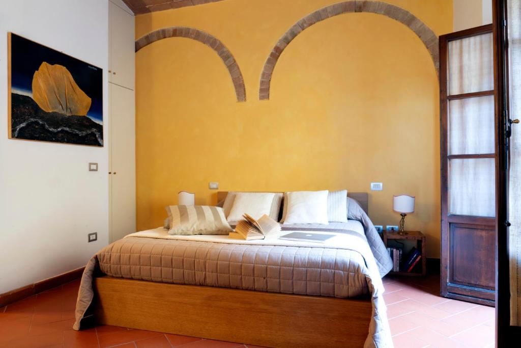 Postel nebo postele na pokoji v ubytování Casa Vacanze Rondini Blu